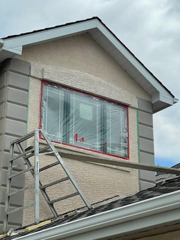 Calgary stucco contractor at work