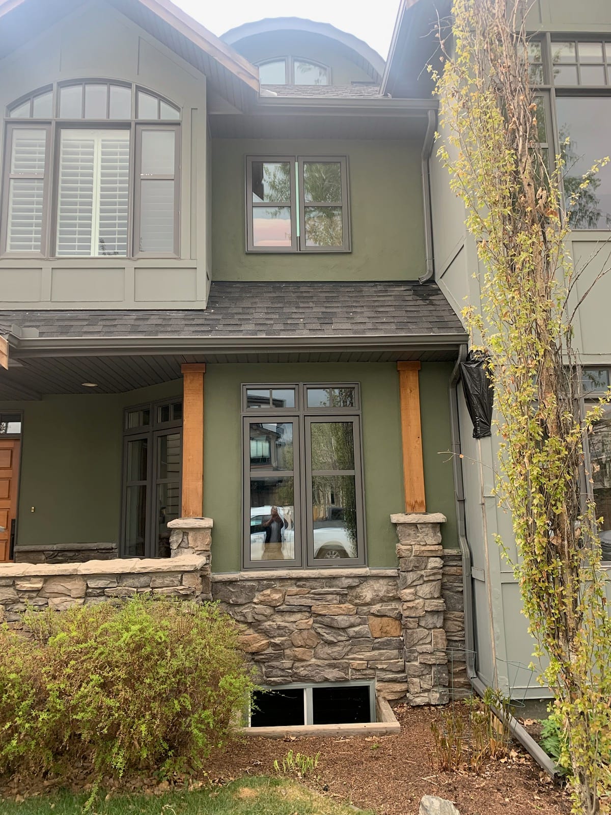 Green stucco acrylic coat on a Calgary townhouse